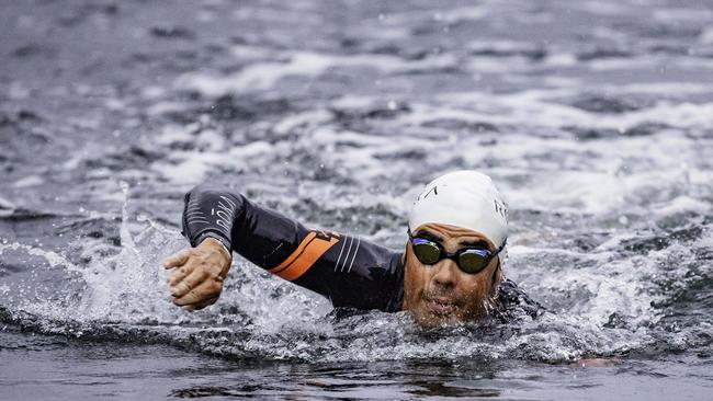 Spanish Tri-athlete Javier Gomez was first out of the water at the Ironman 70.3 Tasmania in Hobart on Sunday 4th February. Picture: Linda Higginson