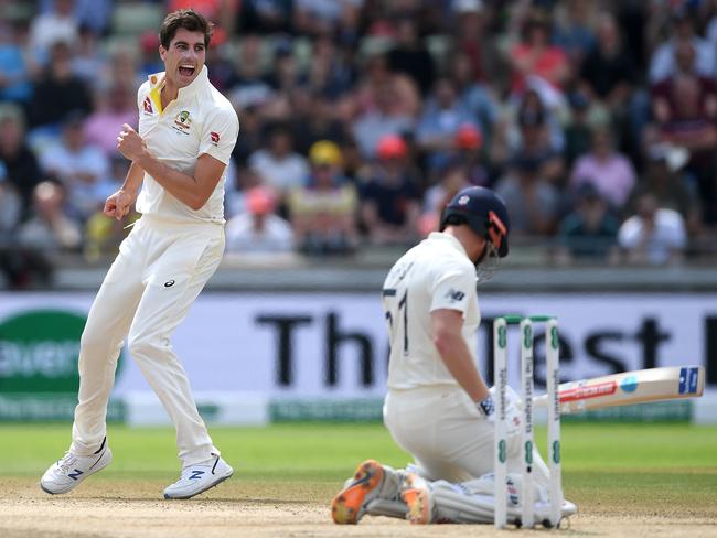 Pat Cummins celebrates dismissing Jonathan Bairstow of England during day five of the first Ashes Test. Picture: Gareth Copley/Getty Images