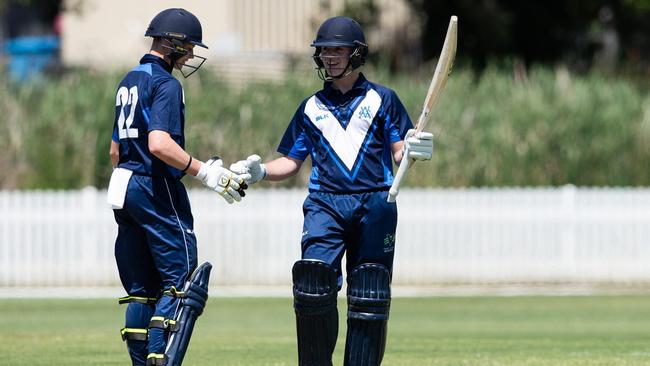 Jake Fraser-McGurk raises his bat after making a ton for Victoria Metro at the Under-17 national championships. Picture: Cricket Australia