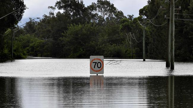 A main road is seen submerged by floodwaters in the suburb of Richmond in Sydney.