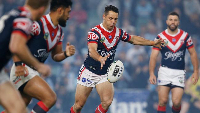 Cooper Cronk of the Roosters kicks ahead during the Qualifying Final between the Sydney Roosters and the Cronulla-Sutherland Sharks in Week 1 of the NRL Finals Series at Allianz Stadium in Sydney, Saturday, September 8, 2018. (AAP Image/Steve Christo) NO ARCHIVING, EDITORIAL USE ONLY