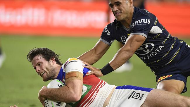 Lachlan Fitzgibbon goes in to score for the Knights, who failed to capitalise on their rivals being down to 11 men. Picture: Getty Images