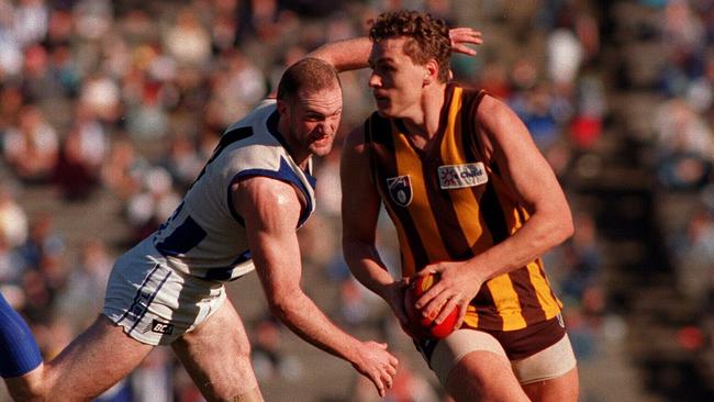 The late Paul Dear (right) played 123 games and kicked 80 goals for Hawthorn.