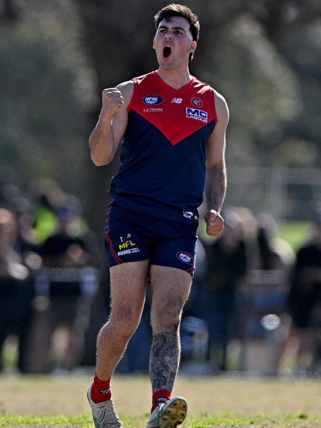 Daniel Jarvis celebrates a goal for Diamond Creek. Picture: Andy Brownbill