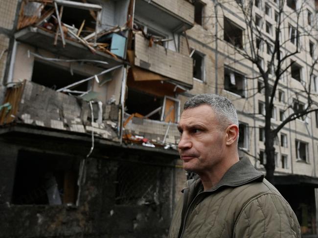 Kyiv's mayor of Vitali Klitschko stands next to a damaged residential building following a missile strike in Kyiv. Picture: AFP