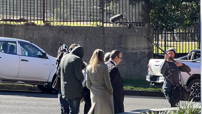 Kais Dahdal being followed by television media leaving Wollongong Courthouse on Monday. Picture: Dylan Arvela