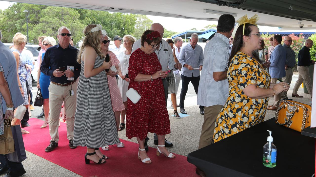 Crowds arrive at the Gold Coast Turf Club during the Magic Millions carnival. Picture: Mike Batterham.