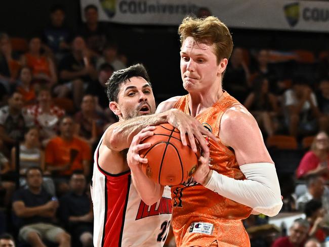 Taipans star Sam Waardenburg and Illawarra’s Todd Blanchfield fight for possession. Picture: Getty Images