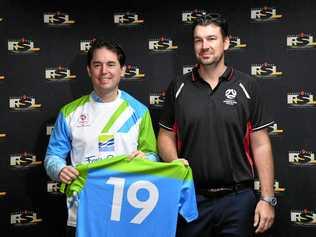 Mayor George Seymour and Football Queensland Wide Bay Technical Director Dale Paxton display the Wide Bay Select team jersey. Picture: Brendan Bowers