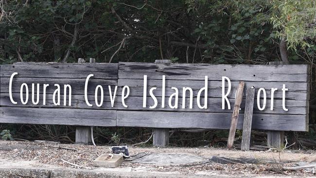 Residents have placed two logs to change the entrance sign at Couran Cove Island Resort. Picture: Tertius Pickard