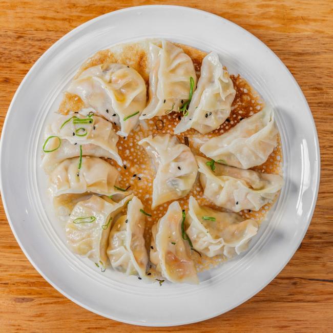 Little Borneo's pan-fried chicken dumplings are from the Chinese end of the Peranakan spectrum and feature beautifully lacy edge. Picture: Supplied