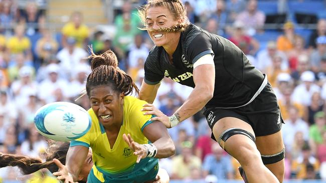 Australia Ellia Green gets a pass off in a match up against New Zealand in a sevens match last year.