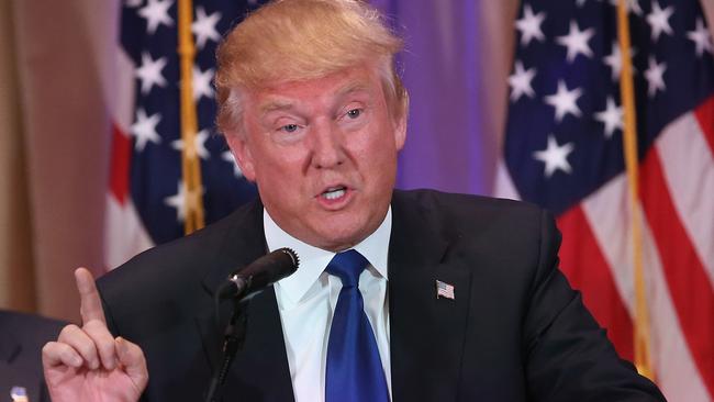 PALM BEACH, FL - MARCH 01: Republican Presidential frontrunner Donald Trump speaks to the media at his Mar-A-Lago Club on Super Tuesday, March 1, 2016 in Palm Beach, Florida. Trump held a press conference, flanked by New Jersey Governor Chris Christie, after the polls closed in a dozen states nationwide. John Moore/Getty Images/AFP == FOR NEWSPAPERS, INTERNET, TELCOS & TELEVISION USE ONLY ==