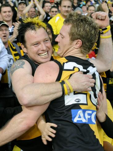 A fan shows his affection for Mitch Morton after a game at Subiaco.