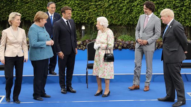 The Queen and Boris Johnson with world leaders at the G7 summit last June. Picture: AFP