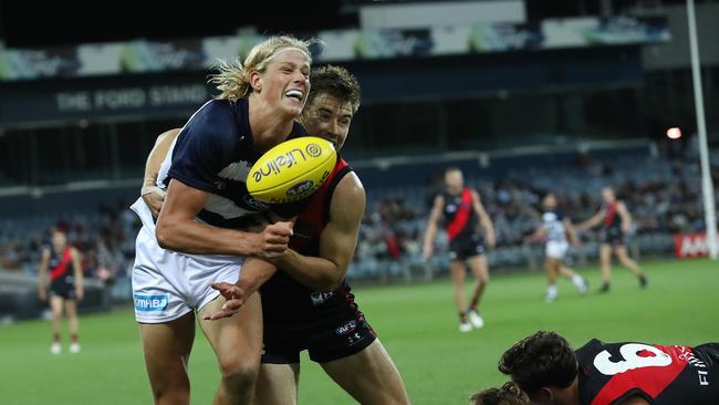 Sam De Koning will play his first AFL gof the Cats clears under pressure . Pic: Michael Klein