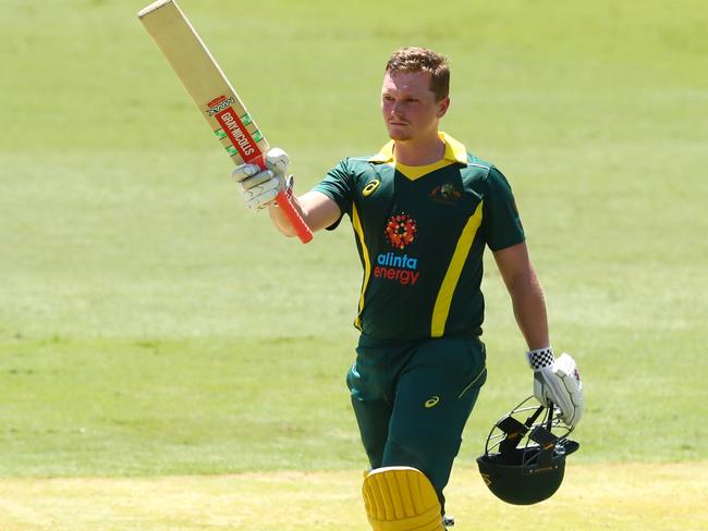 Max Bryant celebrates his century for the Cricket Australia XI against the England Lions at Metricon Stadium on Sunday. Picture: Chris Hyde/Getty Images