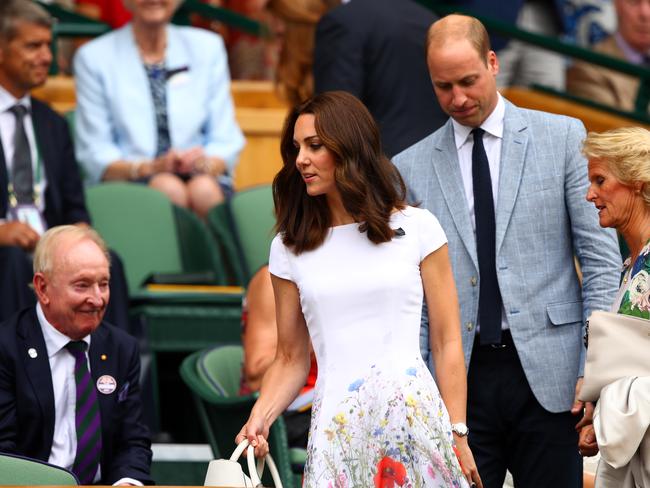 The Duchess of Cambridge, who is a patron of the All England Club, let her short dark tresses tumble over the traditional number as she made her way to her seat. Picture: Getty.