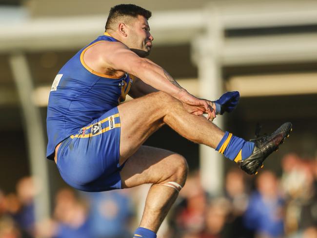 Football SEFNL: Cranbourne v Tooradin-Dalmore. Cranbourne full-forward Marc Holt (the big man) needs 8 goals to reach 1000 career goals. He made it 999. Picture: Valeriu Campan