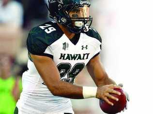 Scott Harding prepares to punt for the Hawaii Warriors against the USC Trojans in Los Angeles. Picture: Harry How Getty Images