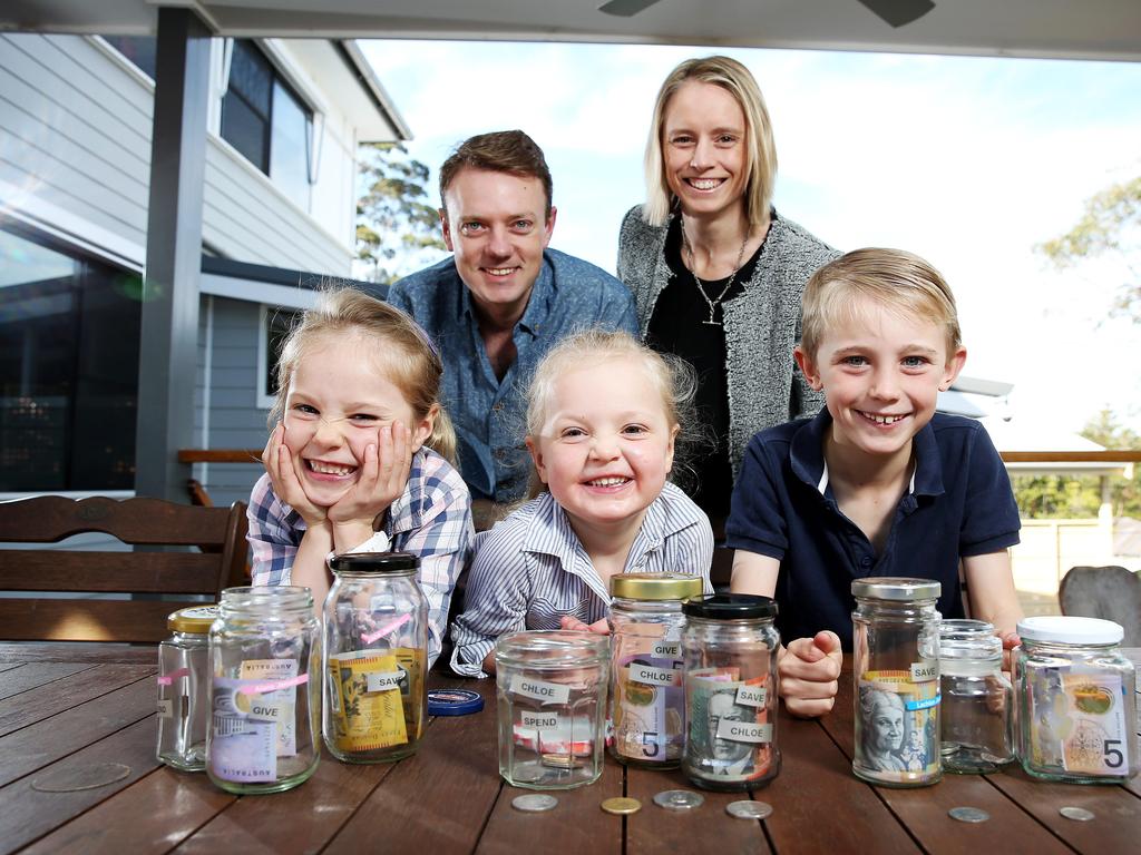 Teira and Peter Jansen with their kids Lachlan 8, Alana, 6, and Chloe, 3, at home in Forestville today. Picture: Tim Hunter.