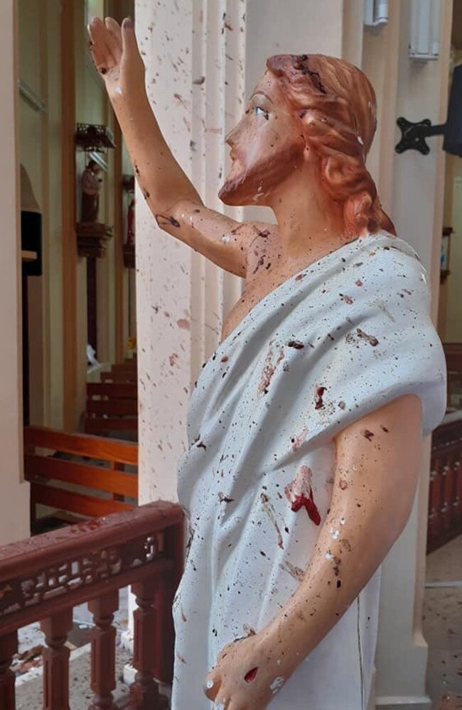 Blood splattered on a statue of Jesus Christ inside one of the churches in Sri Lanka. Picture: Twitter