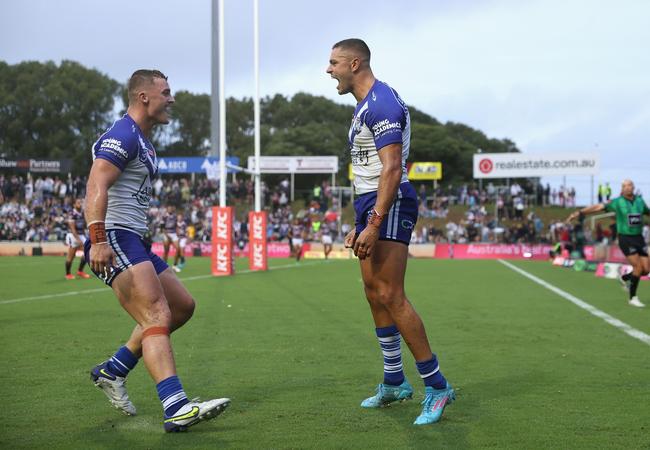 Braidon Burns of the Bulldogs celebrates a try (Photo by Cameron Spencer/Getty Images)