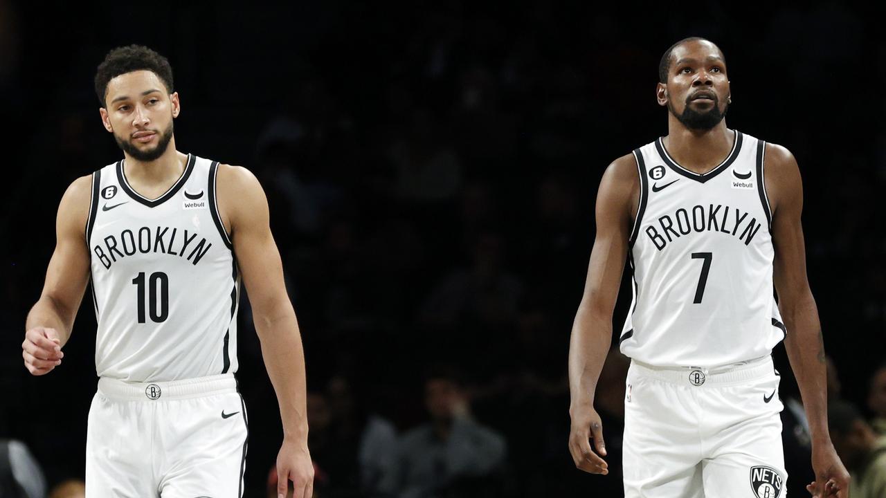 NEW YORK, NEW YORK - OCTOBER 06: Ben Simmons #10 and Kevin Durant #7 of the Brooklyn Nets look on during the second half against the Miami Heat at Barclays Center on October 06, 2022 in the Brooklyn borough of New York City. NOTE TO USER: User expressly acknowledges and agrees that, by downloading and or using this photograph, User is consenting to the terms and conditions of the Getty Images License Agreement. Sarah Stier/Getty Images/AFP