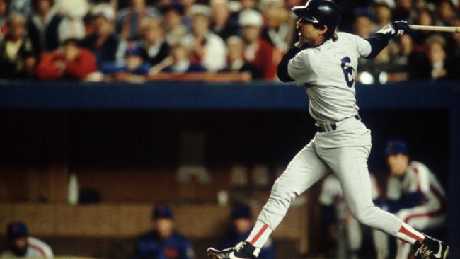 Boston Red Sox Bill Buckner swings at a pitch in the Red Sox 4-3 loss to New Yorrk Mets in game 5 of the 1986 World Series at Shea stadium in New York. Credit: Allsport