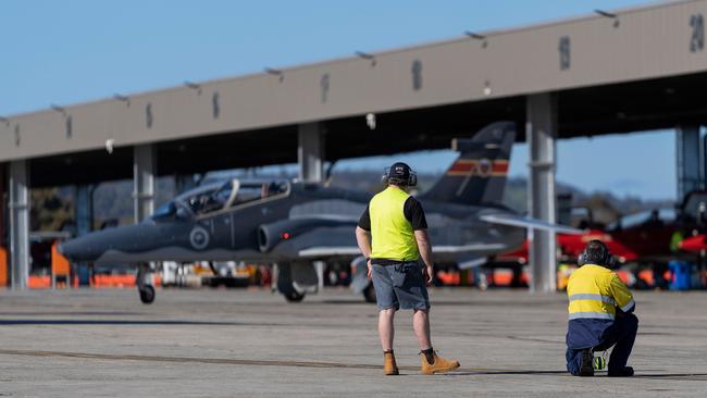 Ground support crew watch on as a Hawk 127 from No. 79 Squadron taxies to the runway to conduct a training flight at RAAF Base Pearce, Western Australia. Picture: LSIS Ronnie Baltoft