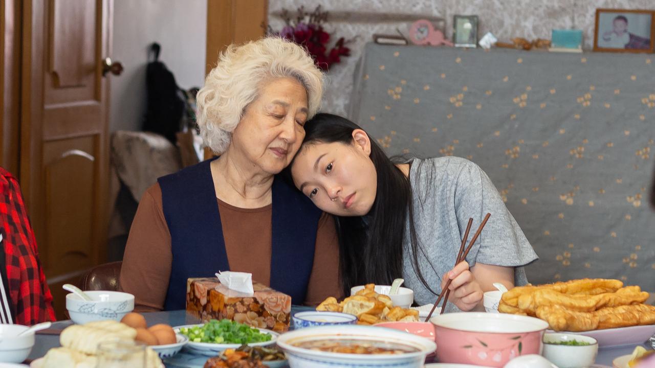 Awkwafina with Zhao Shuzhen in a scene from The Farewell.