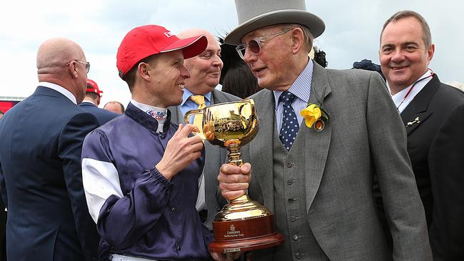 Lloyd Williams with jockey Kerrin McEvoy after the Melbourne Cup. Picture: Ian Currie