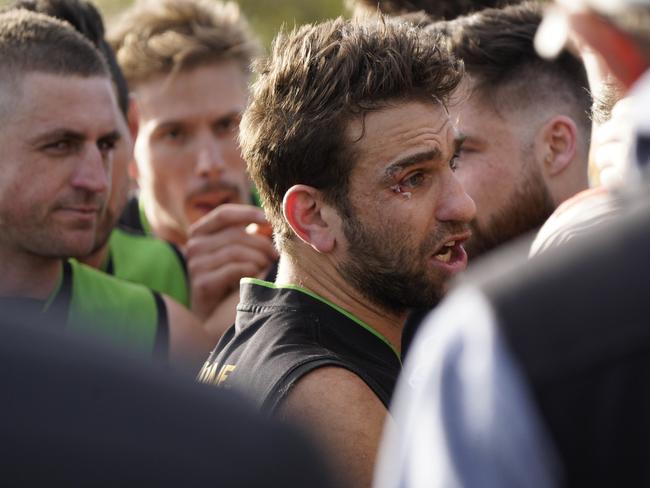 Doveton coach Michael Cardamone at the three quarter time huddle. Picture: Valeriu Campan