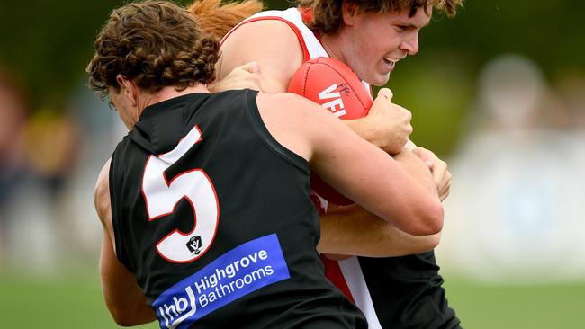 Tom Murphy, No 5, lays a tackle for Frankston. (Photo by Josh Chadwick/AFL Photos/via Getty Images )