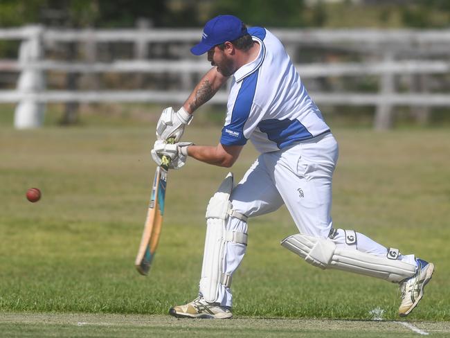 Andrew Ellis hits a ball high into the outfield for Tucabia-Copmanhurst.