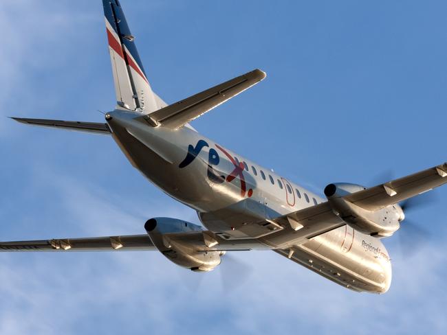 Adelaide, Australia - REX (Regional Express Airlines) Saab 340 twin engined regional commuter aircraft taking off from Adelaide Airport.Escape 15 October 2023Doc HolidayPhoto - iStock