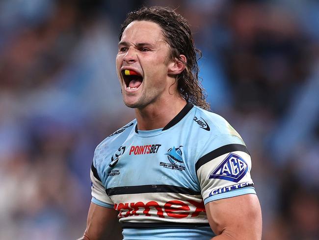 SYDNEY, AUSTRALIA - SEPTEMBER 20:  Nicho Hynes of the Sharks celebrates winning the NRL Semi Final match between Cronulla Sharks and North Queensland Cowboys at Allianz Stadium on September 20, 2024 in Sydney, Australia. (Photo by Jason McCawley/Getty Images)