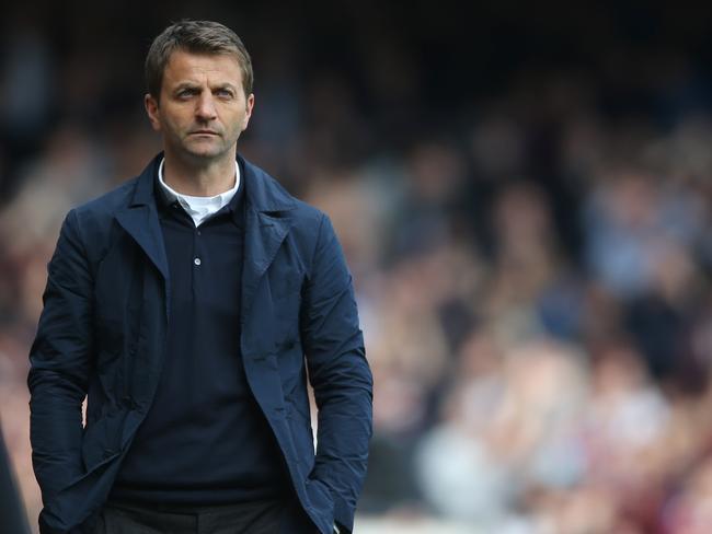 Tottenham's manager Tim Sherwood watches his team play from the technical area during their English Premier League soccer match between West Ham United and Tottenham Hotspur at the Boleyn stadium in London Saturday, May 3 2014. (AP Photo/Alastair Grant)