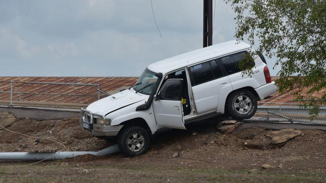 A driver went through a barrier on Daly St, knocking down a power pole in its path. Picture: Raphaella Saroukos