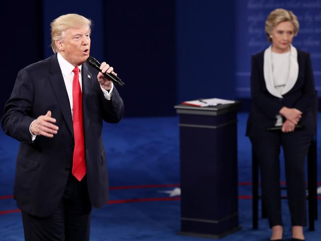 Trump speaks as Democratic presidential nominee former Secretary of State Hillary Clinton listens during the town hall debate at Washington University. Picture: Win McNamee/Getty Images/AFP