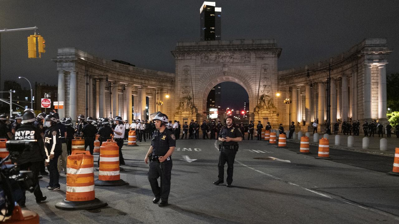 New York police block protesters and activists crossing the Manhattan Bridge from entering the borough. Picture: AP/Craig Ruttle