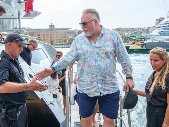 Kyle Sandilands disembarking the super yacht. Picture: Thomas Lisson