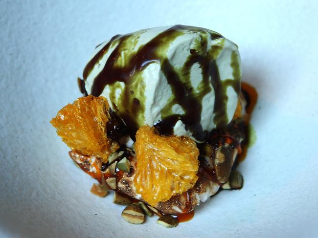 The pumpkin seed sorbet with bitters meringue and mandarin gets points for texture and temperature.