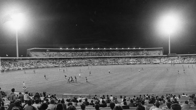 The first football match played under lights at Football Park in 1984.