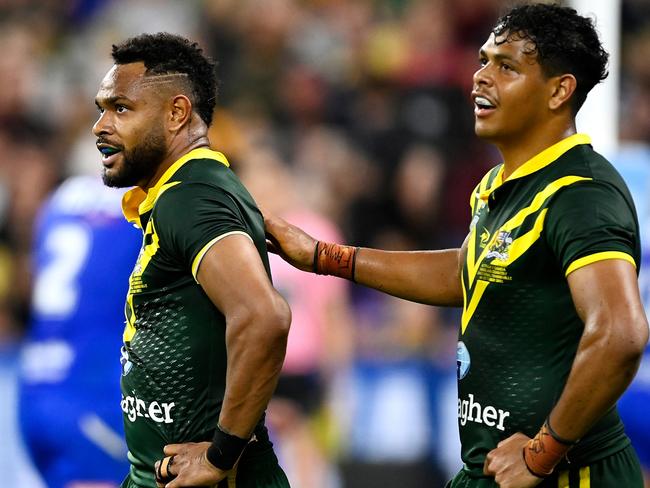 TOWNSVILLE, AUSTRALIA – OCTOBER 14: 3. Hamiso Tabuai-Fidow of the Kangaroos celebrates with Selwyn Cobbo of the Kangaroos after scoring a try during the Mens Pacific Championship match between Australia Kangaroos and Samoa at Queensland Country Bank Stadium on October 14, 2023 in Townsville, Australia. (Photo by Ian Hitchcock/Getty Images)