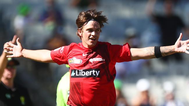 MELBOURNE, AUSTRALIA - JANUARY 19: Cameron Boyce of the Renegades celebrates after dismissing Daniel Sams of the Thunder during the Men's Big Bash League match between the Sydney Thunder and the Melbourne Renegades at Melbourne Cricket Ground, on January 19, 2022, in Melbourne, Australia. (Photo by Mike Owen/Getty Images)