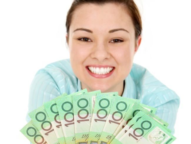 A woman holding up Australian cash. Picture: iStock.