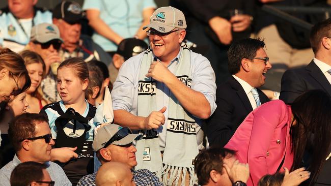 SYDNEY, AUSTRALIA - MAY 19: The Prime Minister of Australia Scott Morrison cheers in the crowd during the round 10 NRL match between the Cronulla Sharks and the Manly Sea Eagles at Shark Park on May 19, 2019 in Sydney, Australia. (Photo by Matt King/Getty Images)