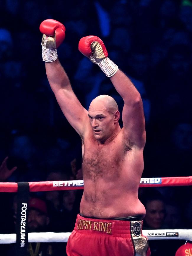 Britain's Tyson Fury reacts after the referee stopped the fight against Britain's Derek Chisora.