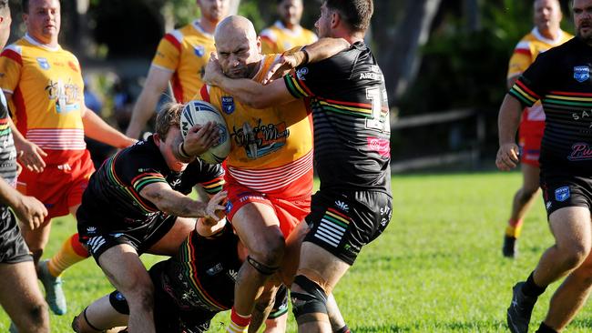 Coffs Harbour forward Peter Uikelotu charging into the defence. Picture: Leigh Jensen